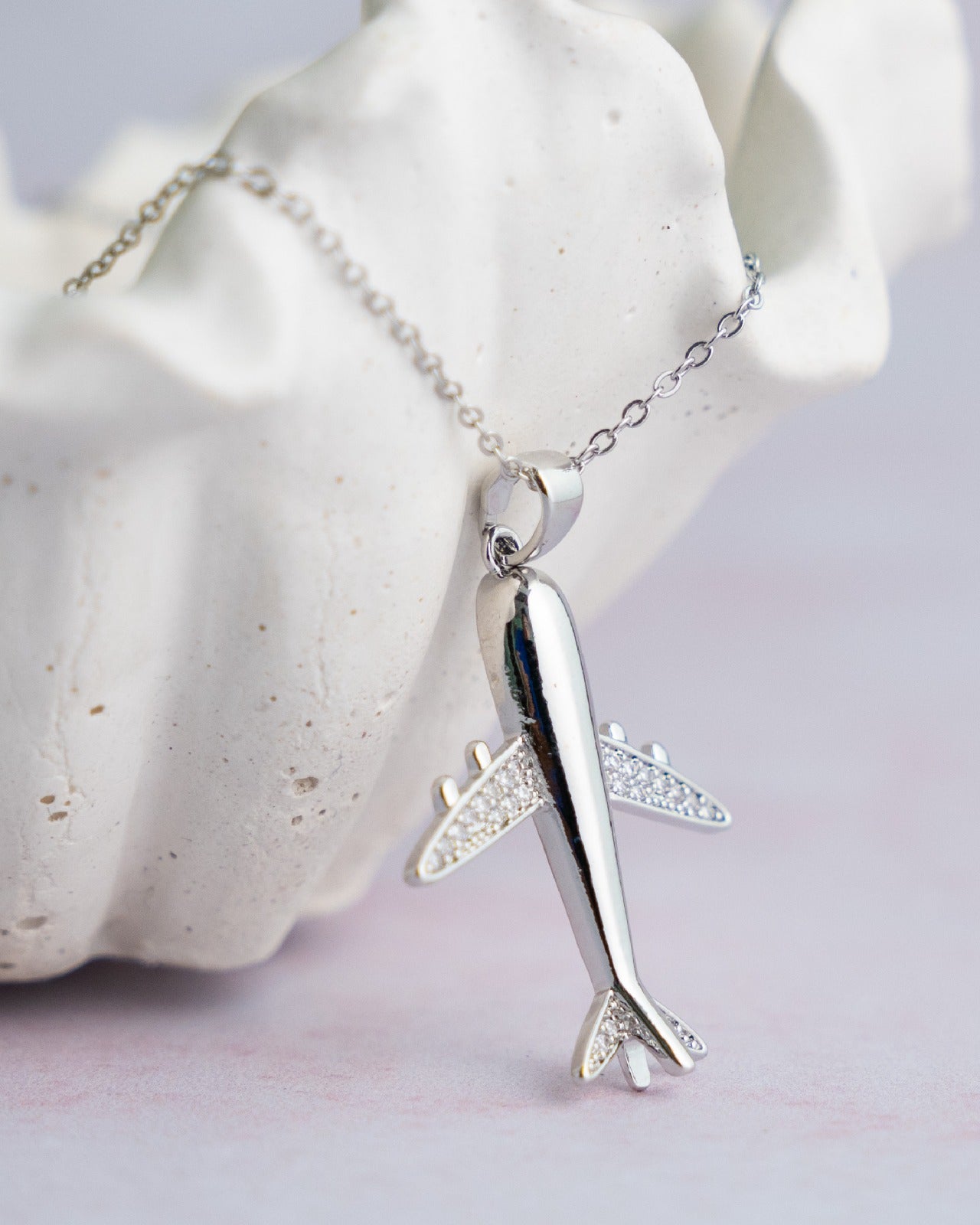 Collar con dije de avión