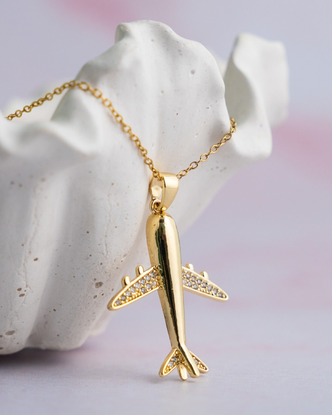 Collar con dije de avión