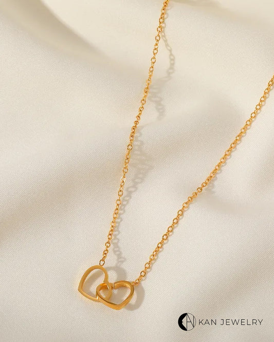 Collar de corazón entrelazado Dorado y plateado