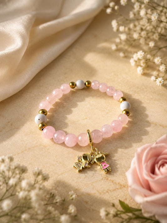 pulsera de cuarzo rosa con dijes CHILDS
